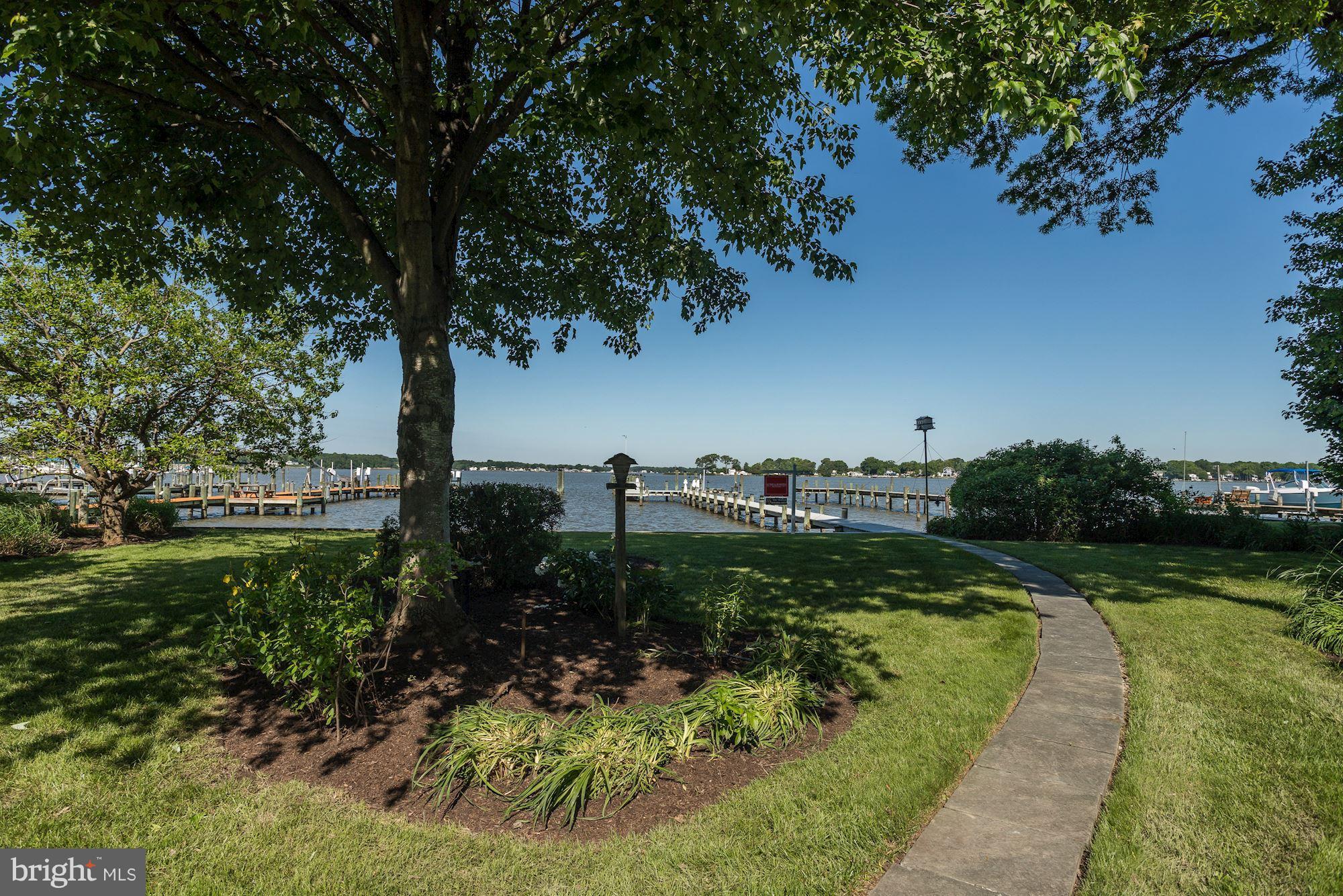 1610 Holly Tree Road Baltimore, MD 21220 - Photo 26 of 29 LANDSCAPED BACKYARD W/WALKWAY TO PIER/LIGHTING