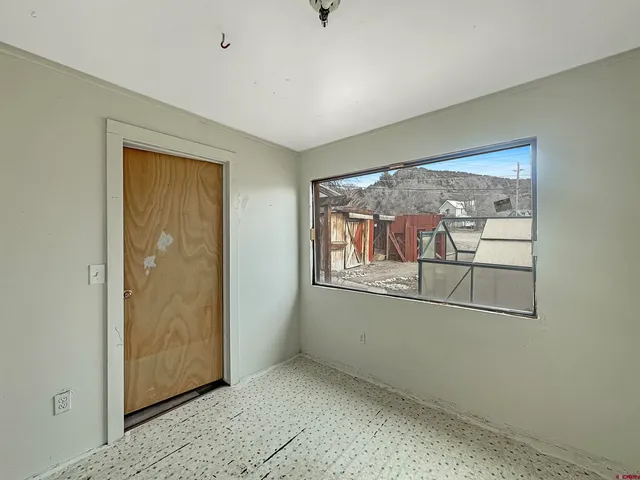 a view of an empty room with window