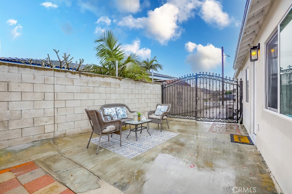 6441 A Mohawk Road Westminster, CA 92683 - Photo 6 of 15 a backyard of a house with table and chairs