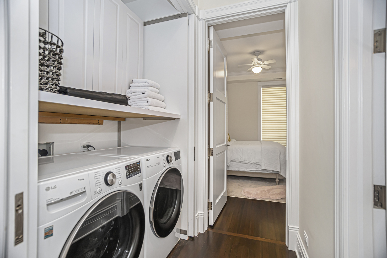 1302 North Ritchie Court Chicago, IL 60610 - Photo 18 of 31 a view of washer and dryer with bathroom in the background
