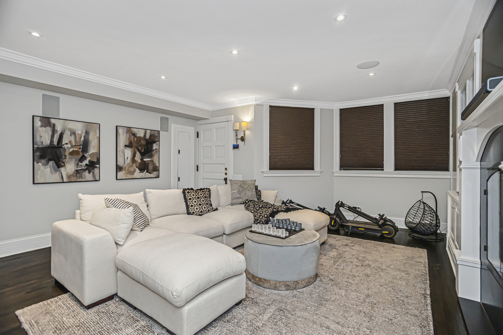 1302 North Ritchie Court Chicago, IL 60610 - Photo 24 of 31 a living room with furniture a window and a flat screen tv