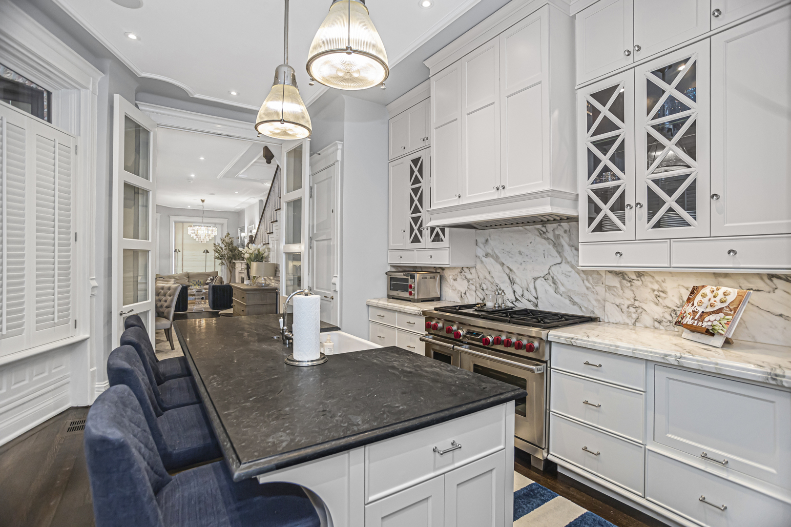 1302 North Ritchie Court Chicago, IL 60610 - Photo 9 of 31 a kitchen with granite countertop a sink a stove and cabinets