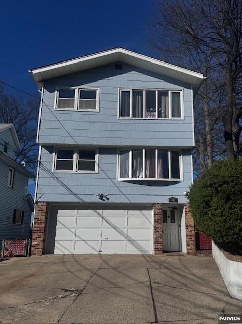 a front view of a house with yard