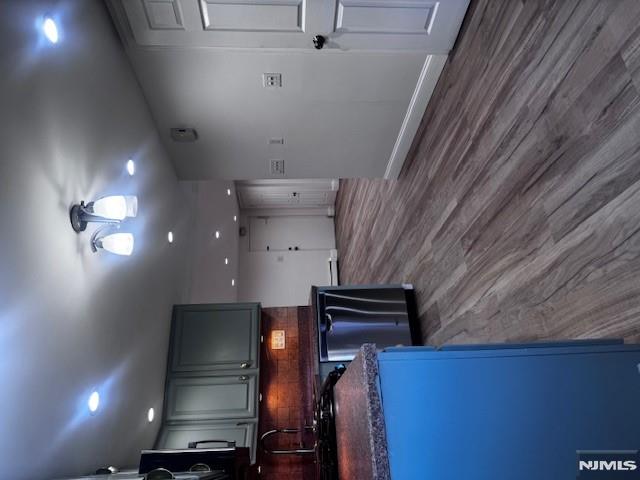 687 Probst Avenue Fairview, NJ 07022 - Photo 5 of 11 an open kitchen with a sink and a refrigerator