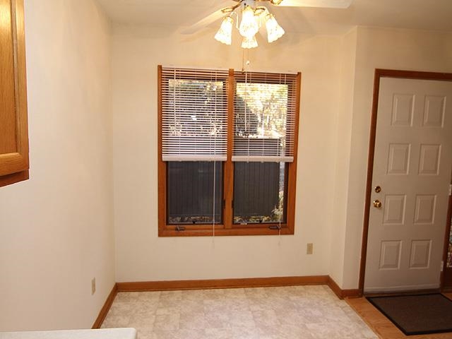 4313 Southwind Drive Raleigh, NC 27613 - Photo 6 of 16 Sunny breakfast nook with view of front patio.