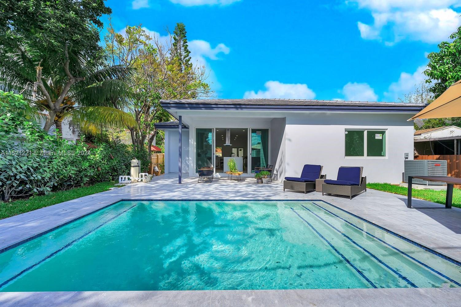 2356 Southwest 11th Street Miami, FL 33135 - Photo 27 of 51 a view of a house with backyard porch and sitting area