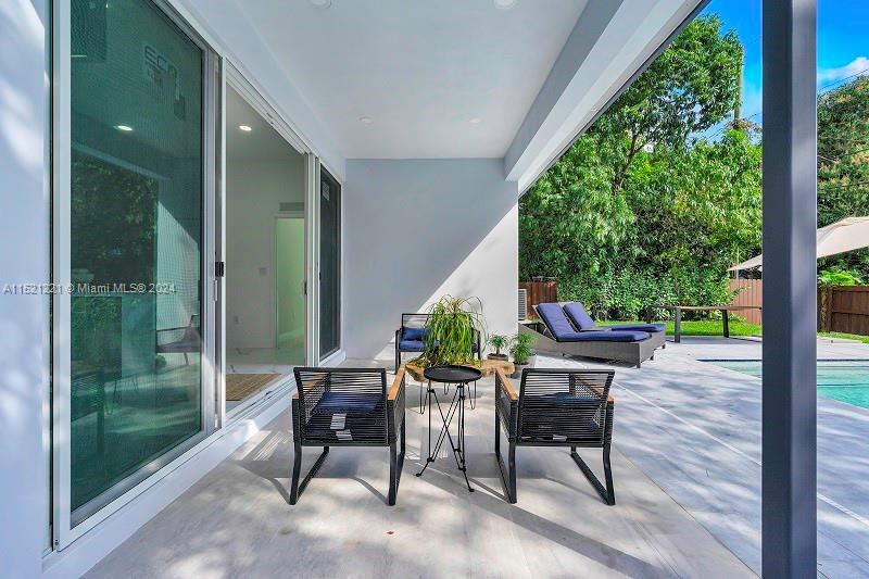 2356 Southwest 11th Street Miami, FL 33135 - Photo 30 of 51 a view of two chairs in the porch