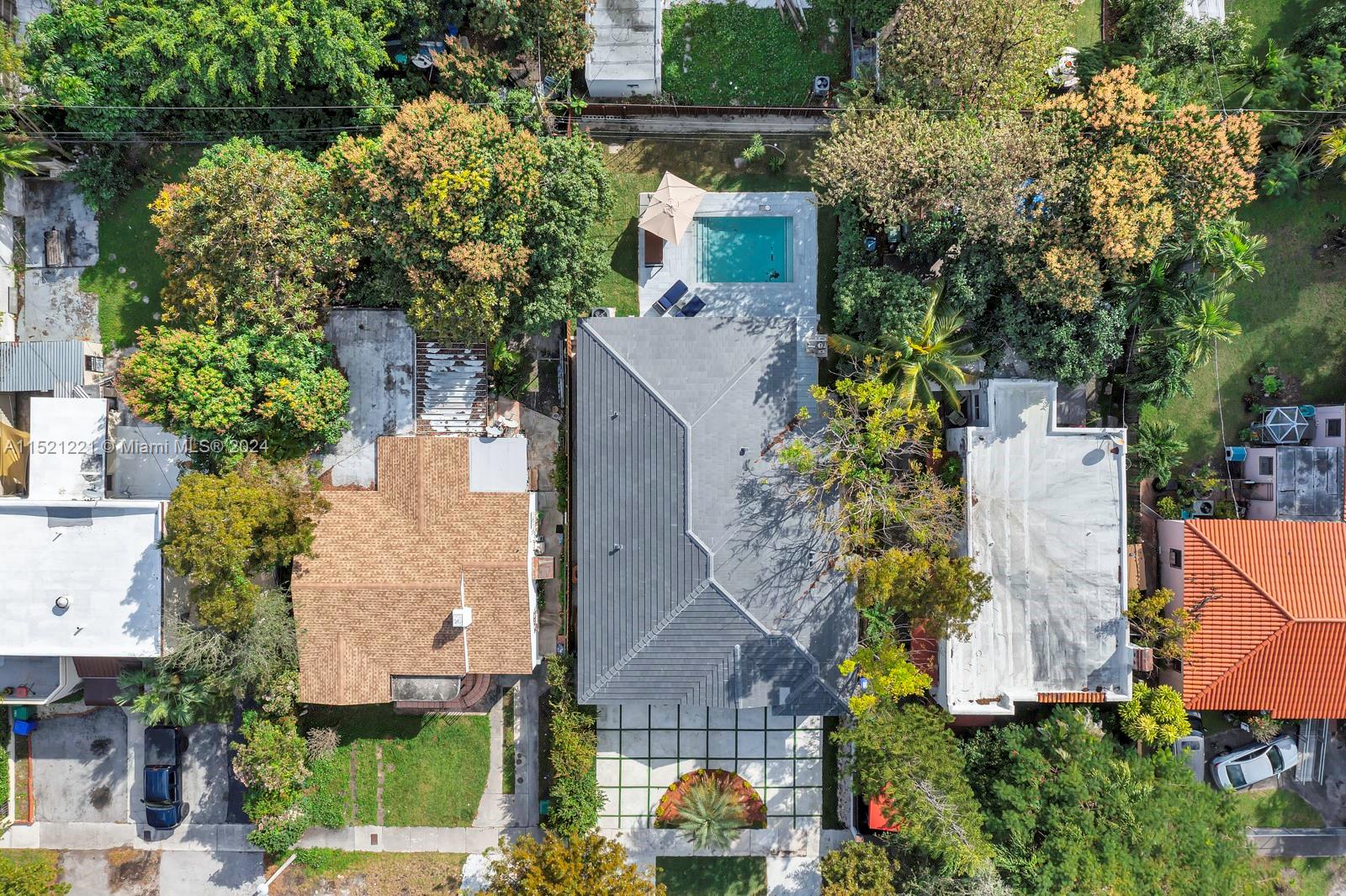 2356 Southwest 11th Street Miami, FL 33135 - Photo 3 of 51 an aerial view of a house with a yard and garden