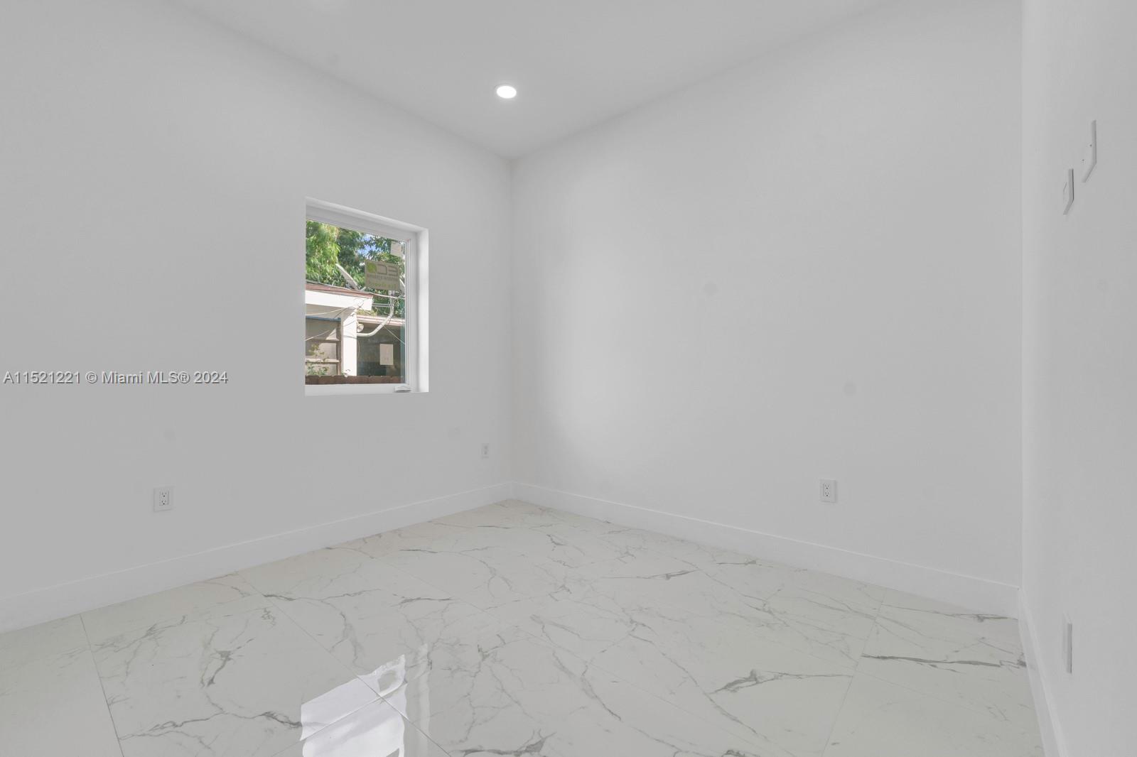 2356 Southwest 11th Street Miami, FL 33135 - Photo 34 of 51 a view of an empty room with a window