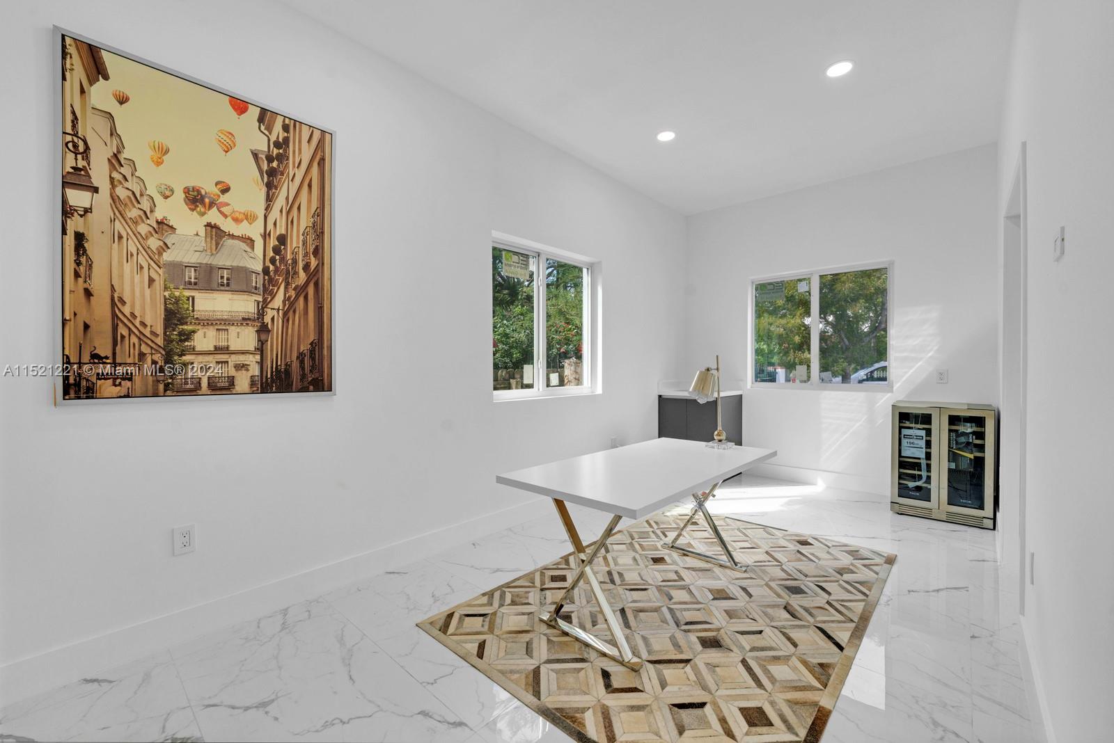 2356 Southwest 11th Street Miami, FL 33135 - Photo 48 of 51 a view of a dining room with furniture and a window