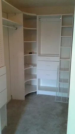 a view of an empty walk in closet