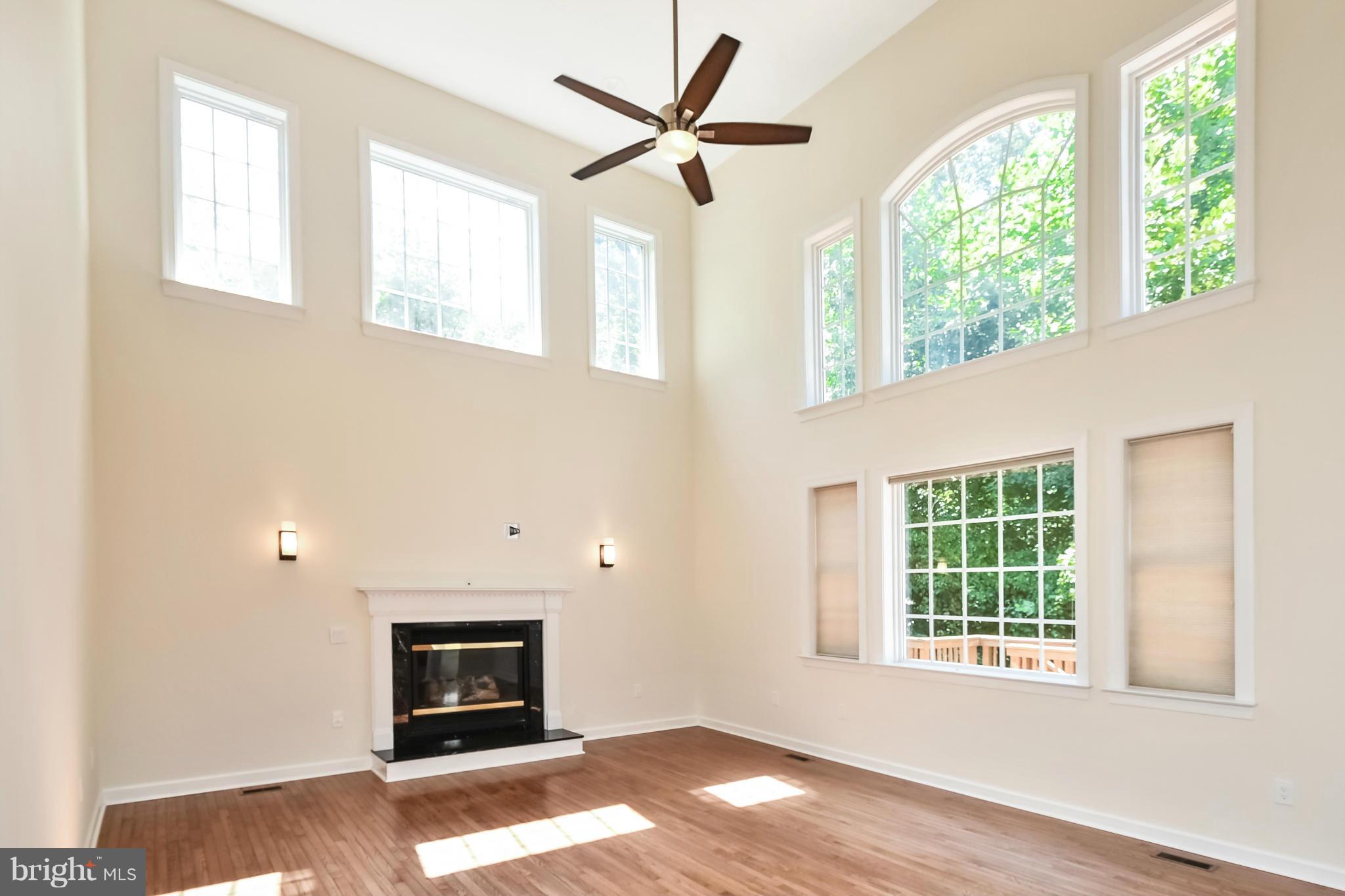 9 Johnson Mill Ridge Fredericksburg, VA 22406 - Photo 12 of 30 a view of an empty room with a window and wooden floor