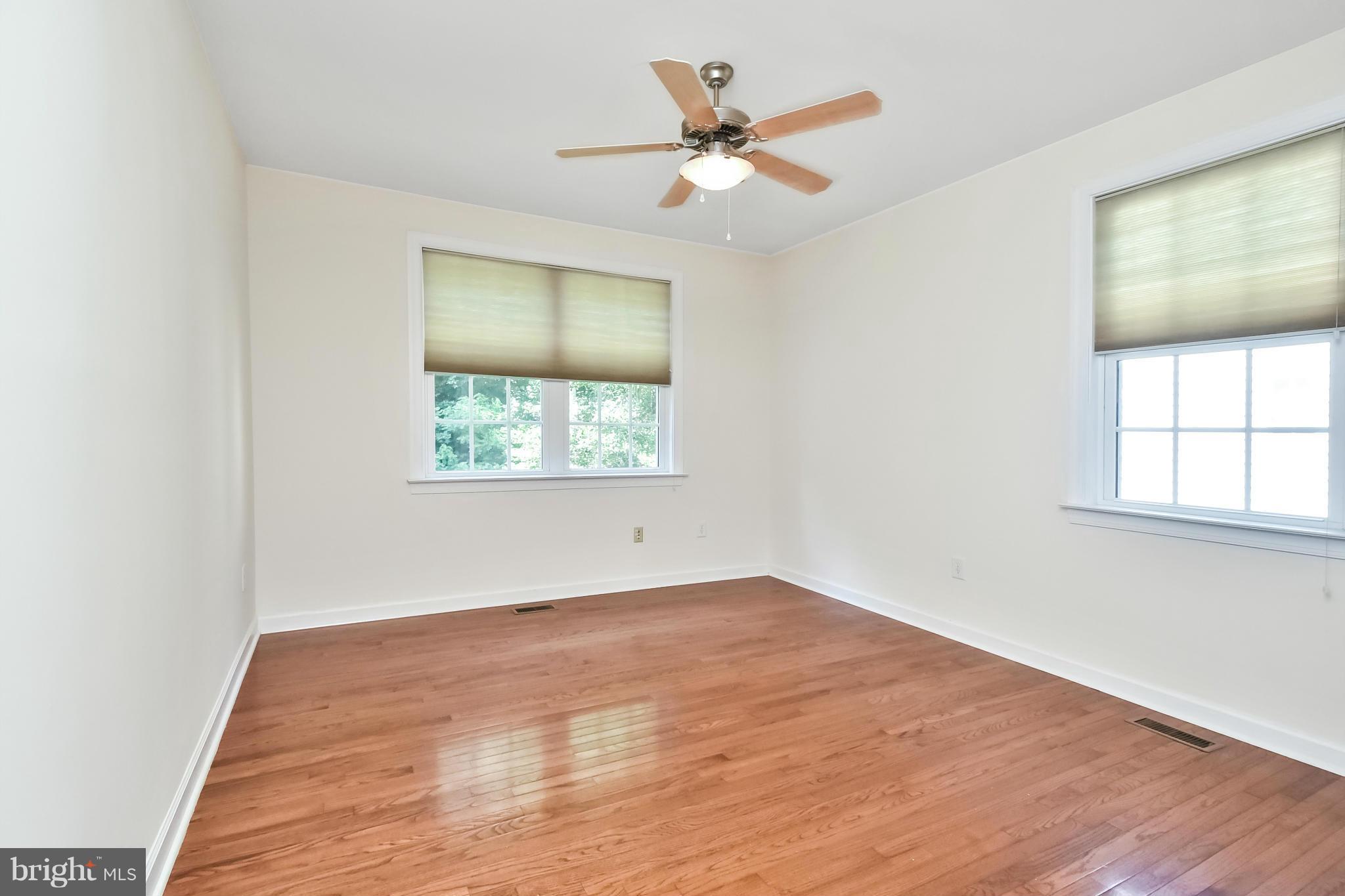 9 Johnson Mill Ridge Fredericksburg, VA 22406 - Photo 15 of 30 an empty room with wooden floor and windows