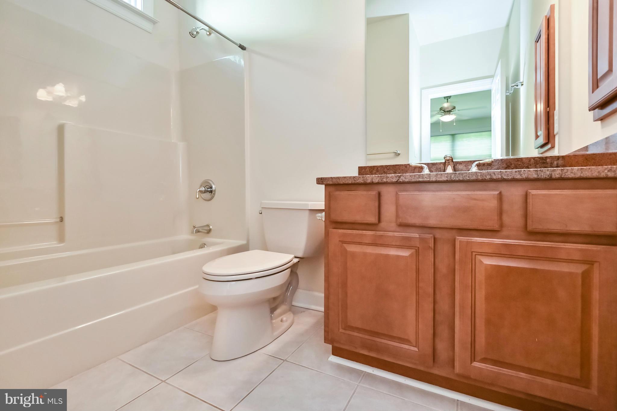 9 Johnson Mill Ridge Fredericksburg, VA 22406 - Photo 16 of 30 a bathroom with a toilet a sink and a bathtub