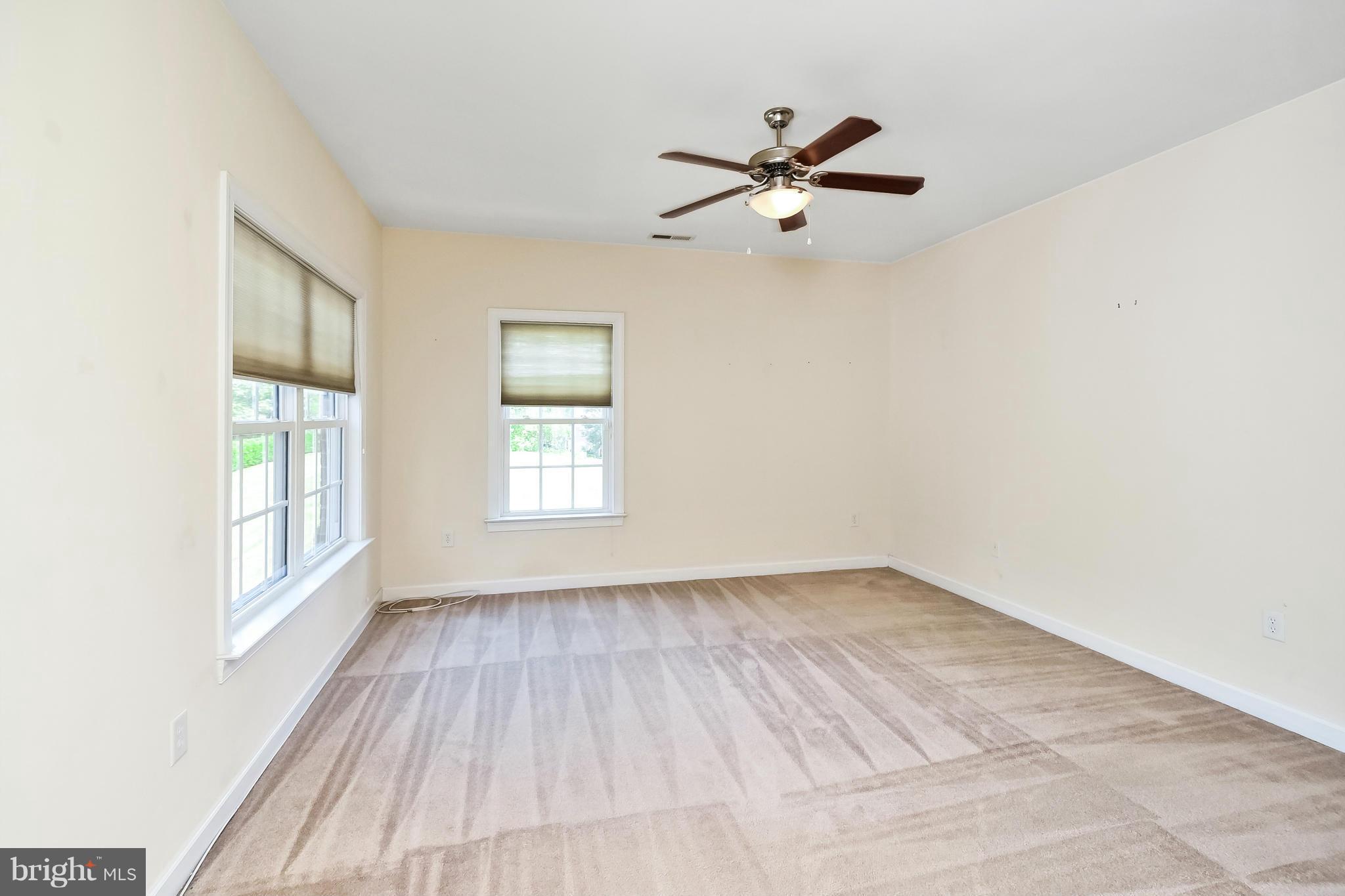 9 Johnson Mill Ridge Fredericksburg, VA 22406 - Photo 25 of 30 a view of empty room with wooden floor and fan