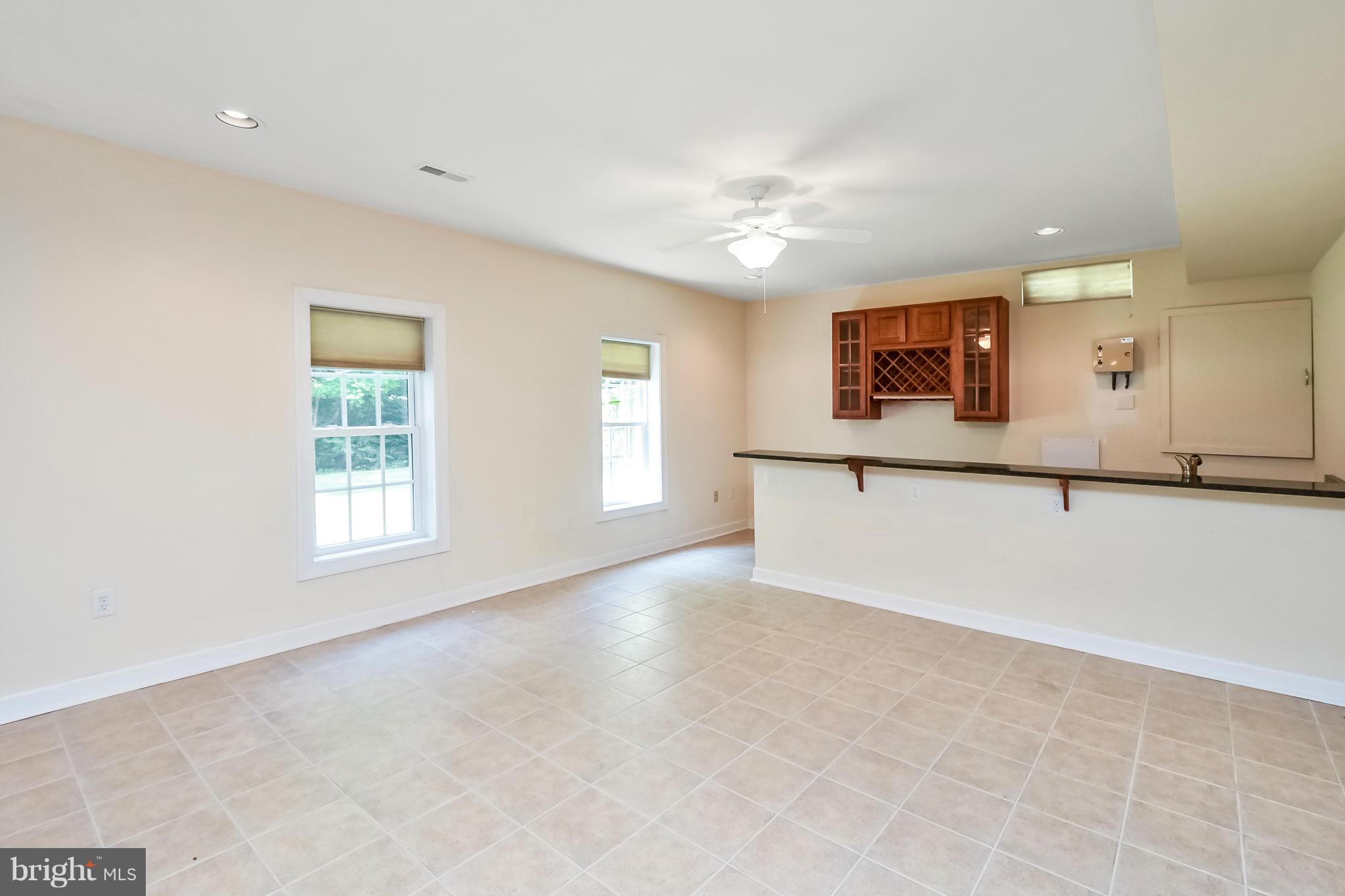 9 Johnson Mill Ridge Fredericksburg, VA 22406 - Photo 27 of 30 an empty room with windows and fan