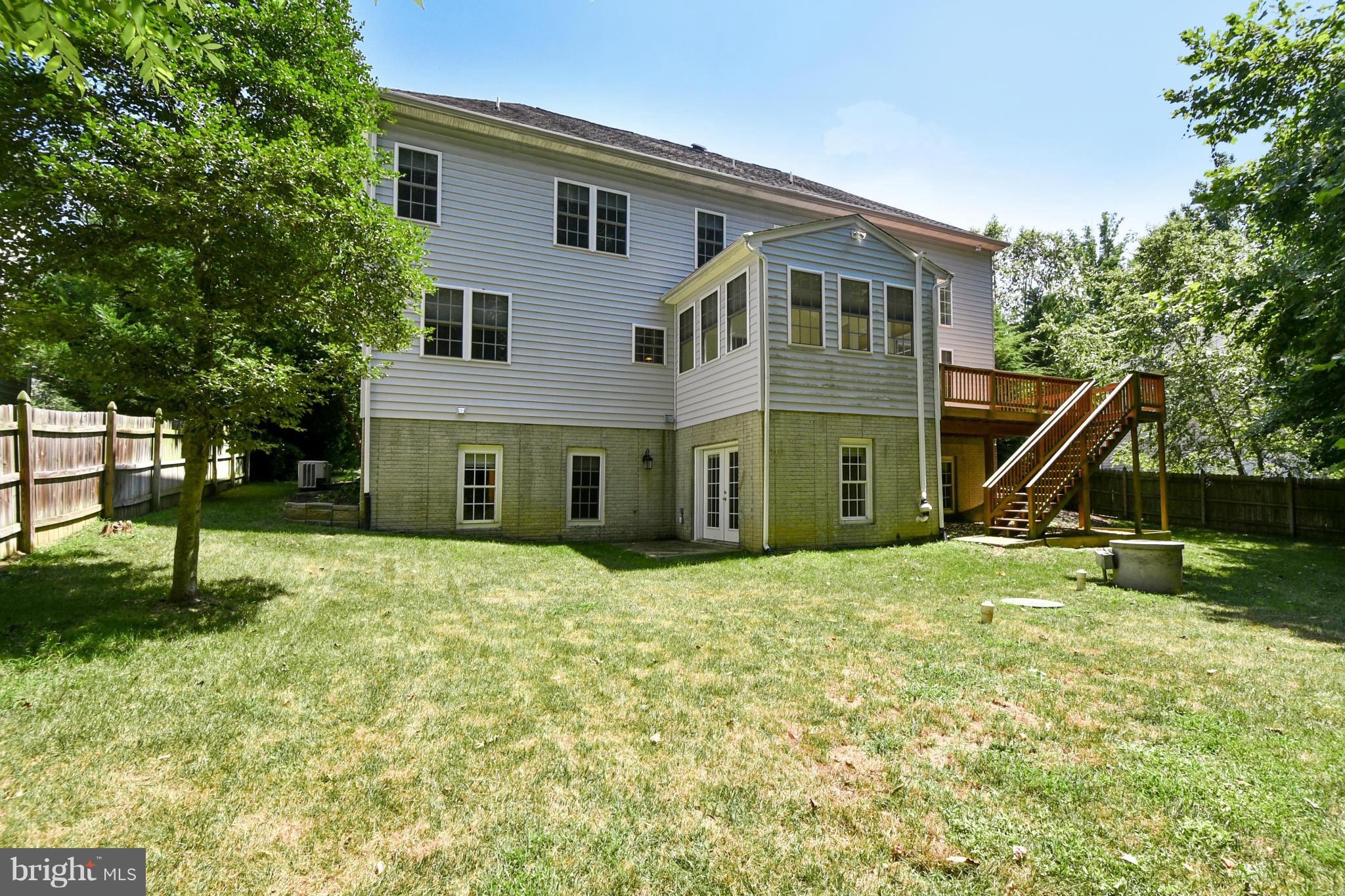 9 Johnson Mill Ridge Fredericksburg, VA 22406 - Photo 29 of 30 a front view of a house with a yard