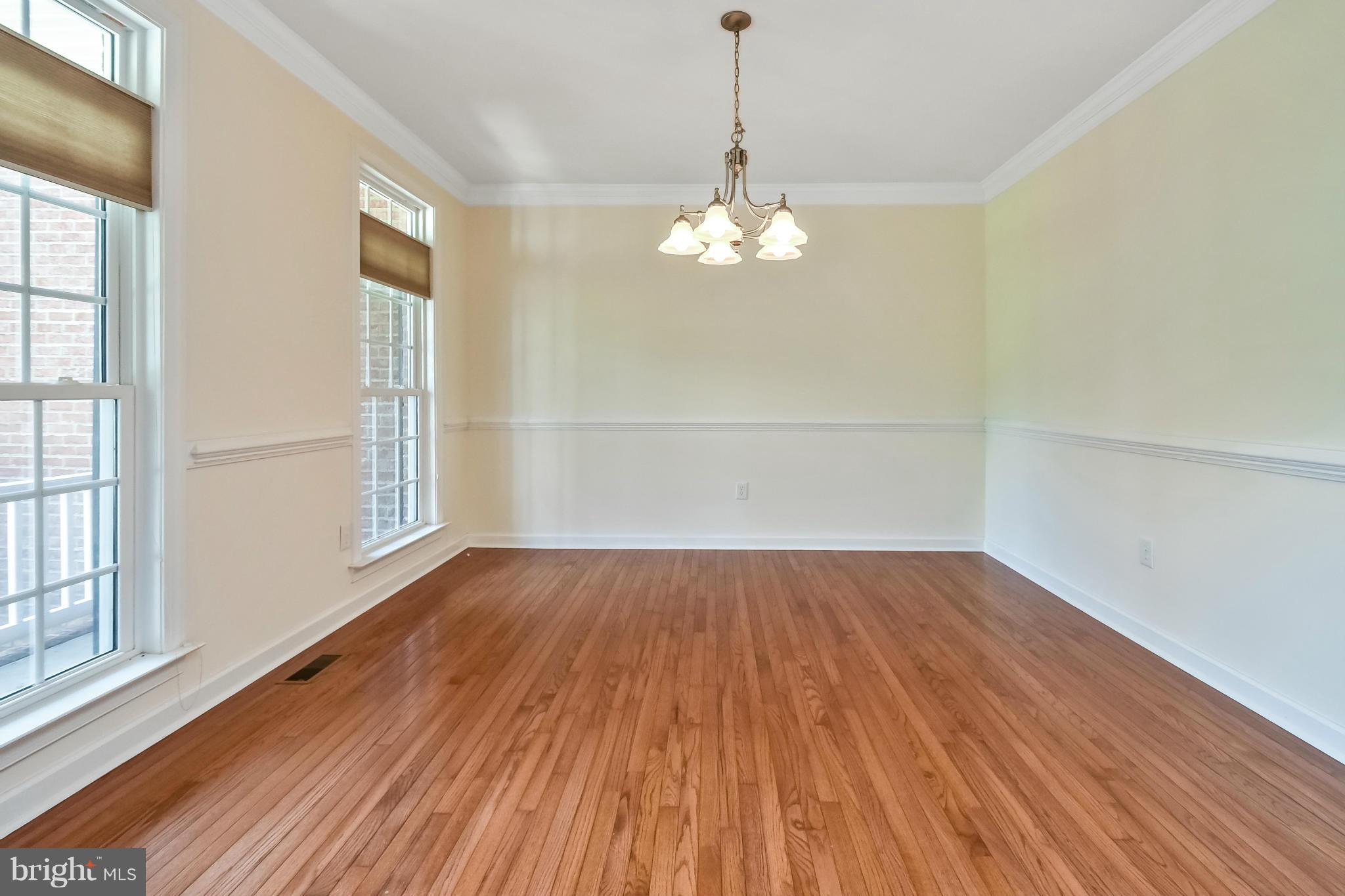 9 Johnson Mill Ridge Fredericksburg, VA 22406 - Photo 6 of 30 a view of empty room with wooden floor and window