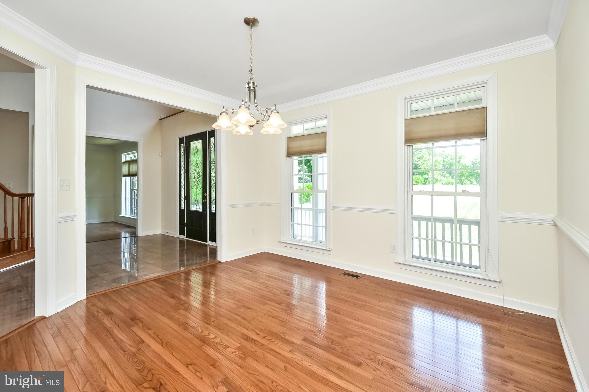 9 Johnson Mill Ridge Fredericksburg, VA 22406 - Photo 7 of 30 a view of livingroom with hardwood floor and hallway