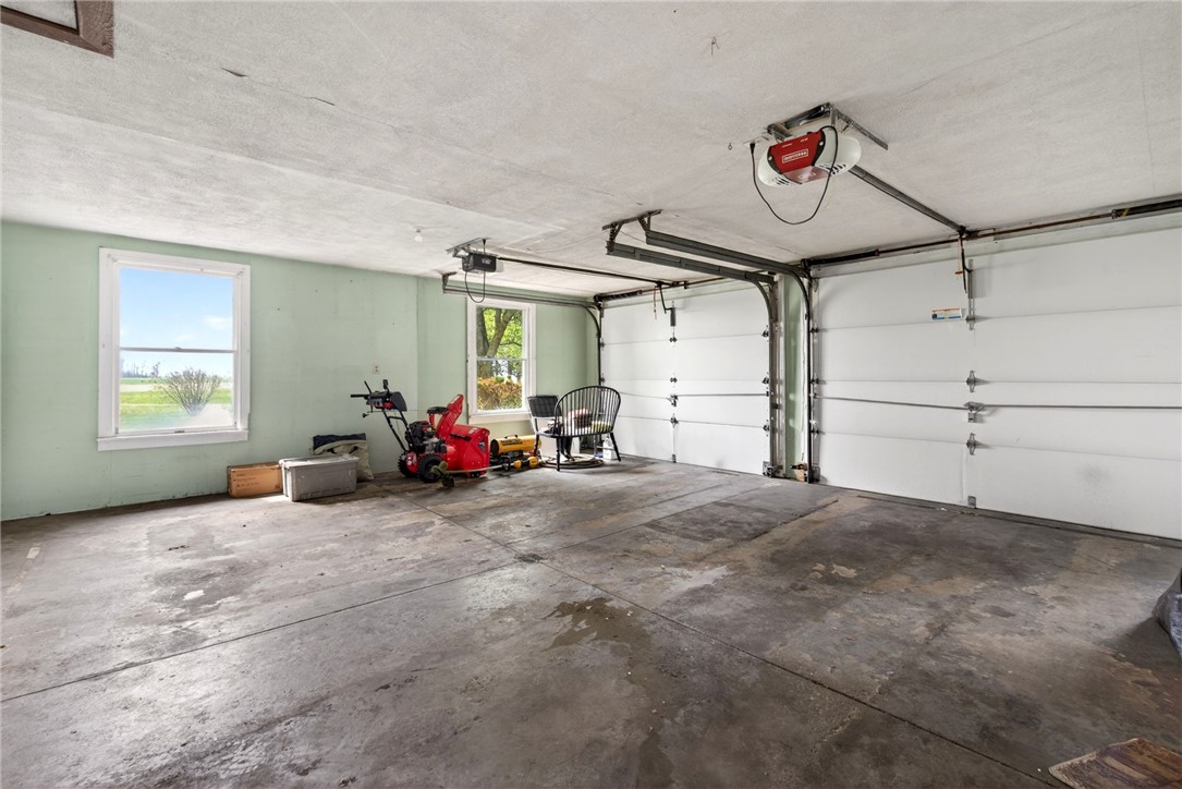 7988 McCool Road Greenville, OH 45331 - Photo 23 of 50 This spacious garage offers practical utility with ample room for vehicles and storage.