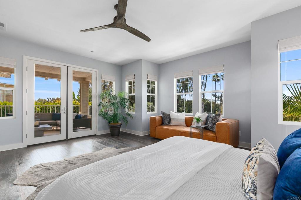661 Jocelyn Way Encinitas, CA 92024 - Photo 13 of 21 a bedroom with furniture and large windows