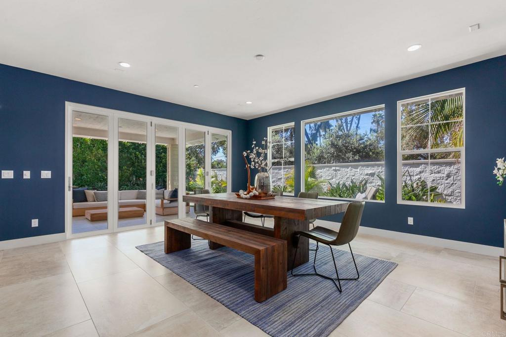 661 Jocelyn Way Encinitas, CA 92024 - Photo 6 of 21 a living room with furniture and large windows