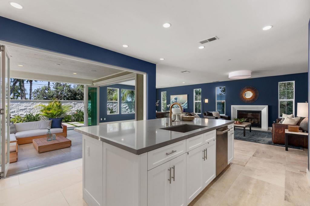 661 Jocelyn Way Encinitas, CA 92024 - Photo 9 of 21 a kitchen with sink stove and living room
