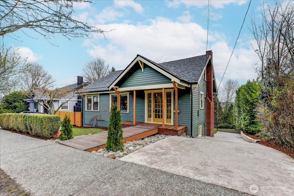 3224 25th Avenue South Seattle, WA 98144 - Photo 2 of 4 a front view of a house with garden