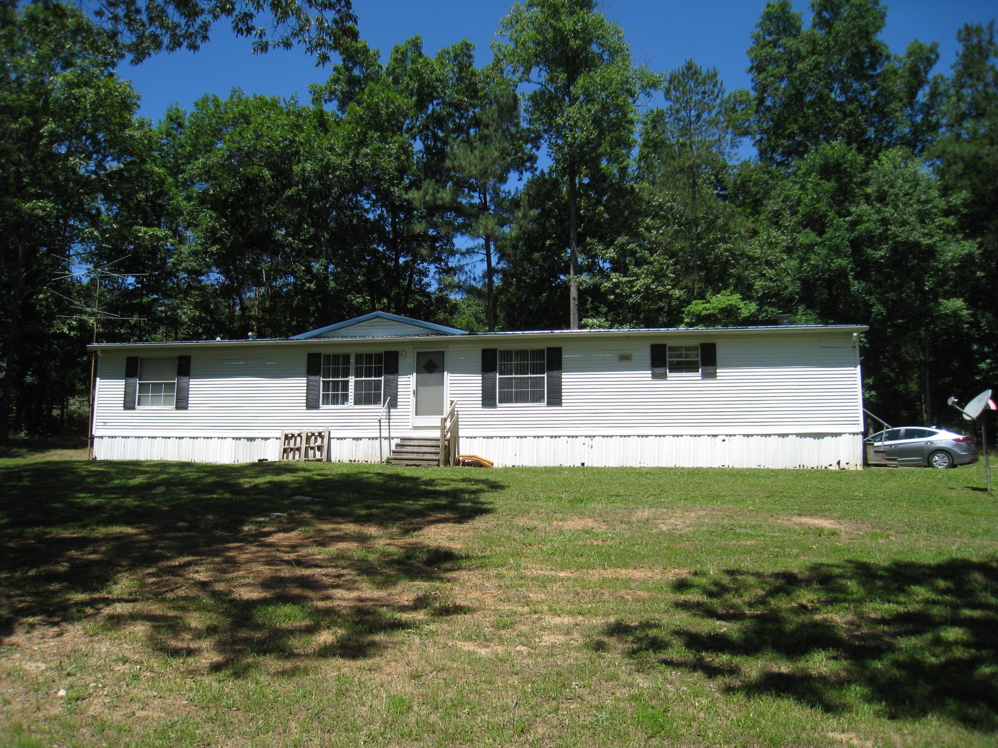59 County Road 100 Decatur, TN 37322 - Photo 1 of 12 a house view with a outdoor space