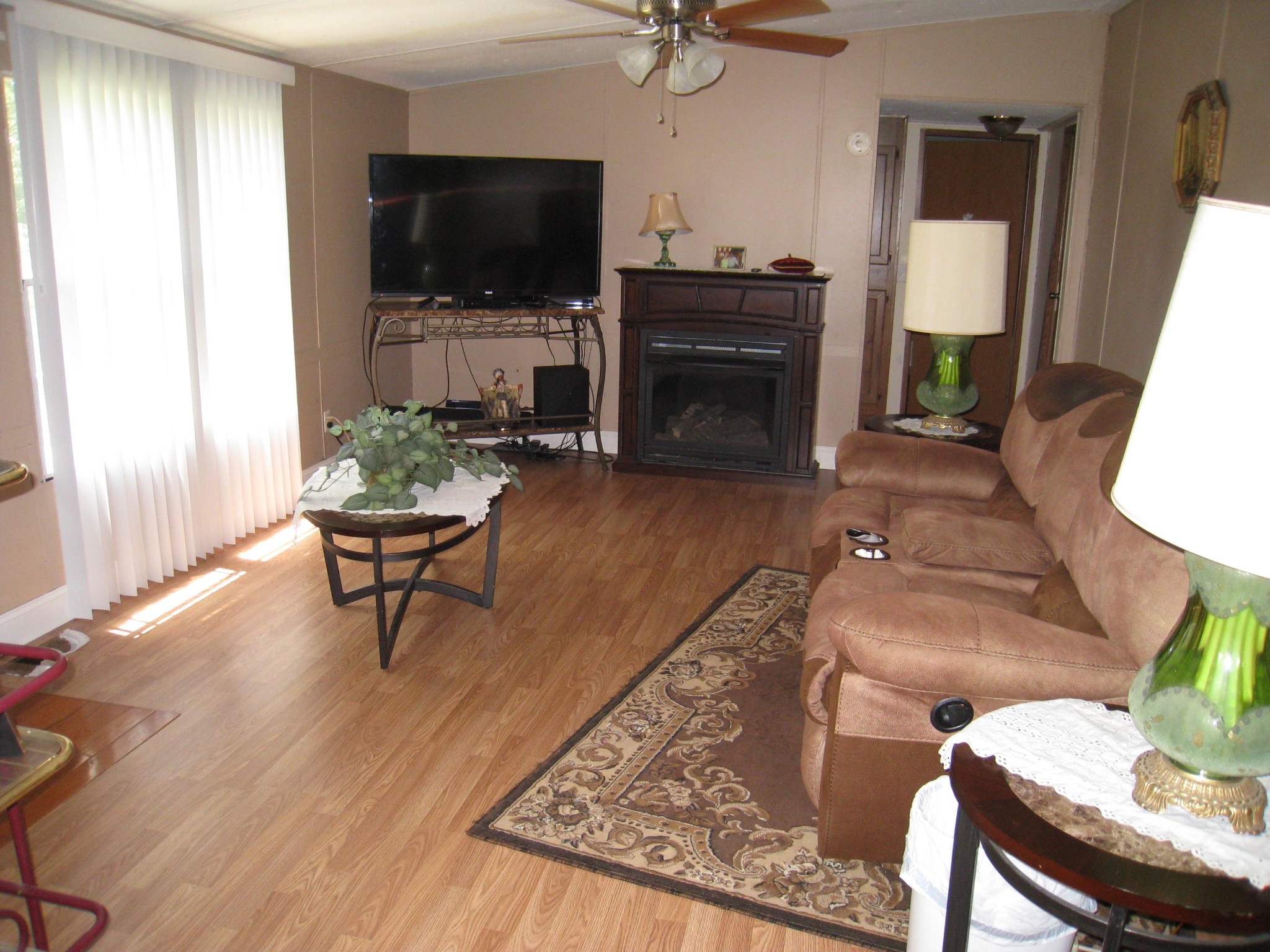 59 County Road 100 Decatur, TN 37322 - Photo 2 of 12 a living room with furniture and a flat screen tv
