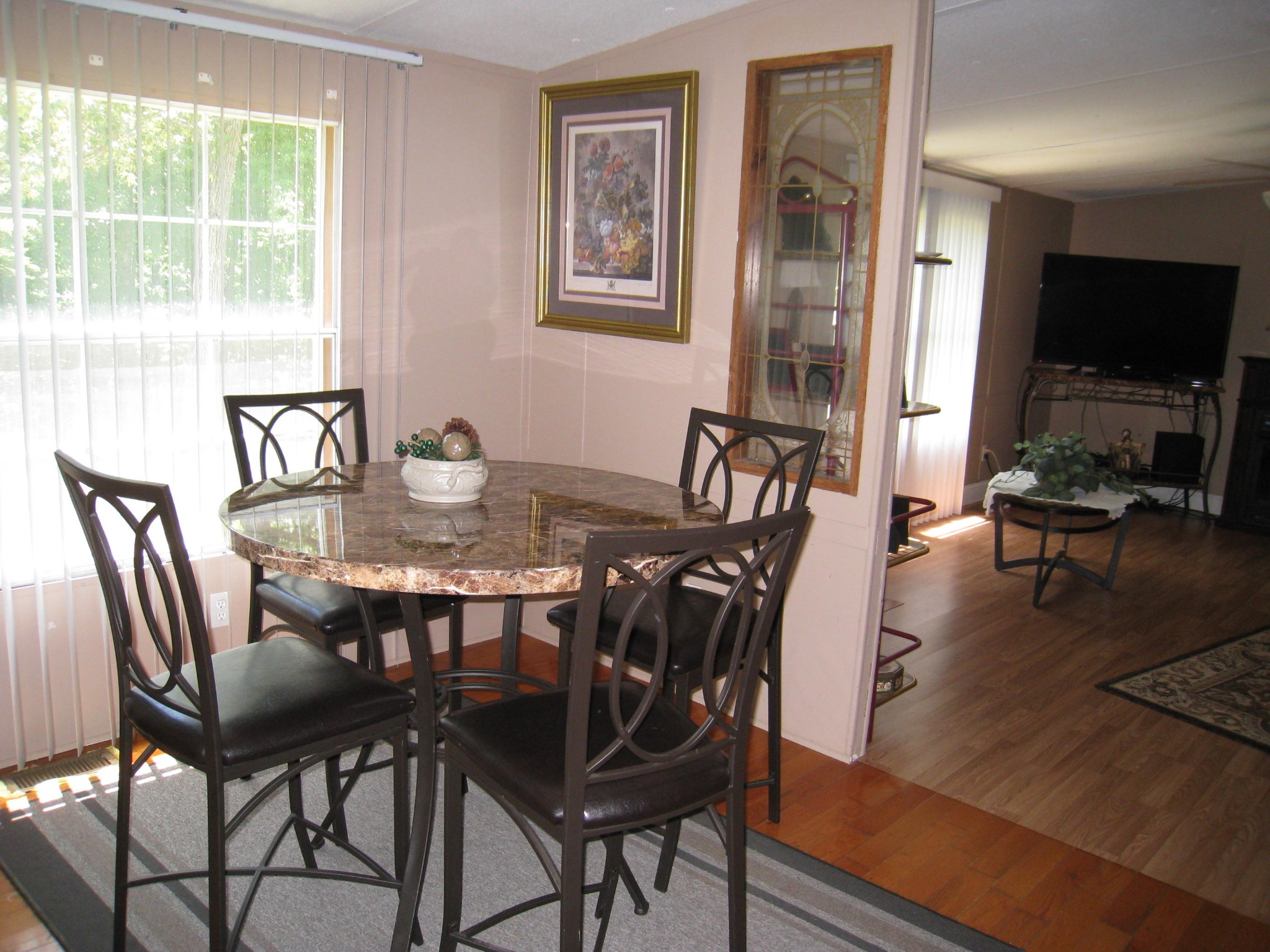59 County Road 100 Decatur, TN 37322 - Photo 6 of 12 a view of a dining room with furniture window and wooden floor