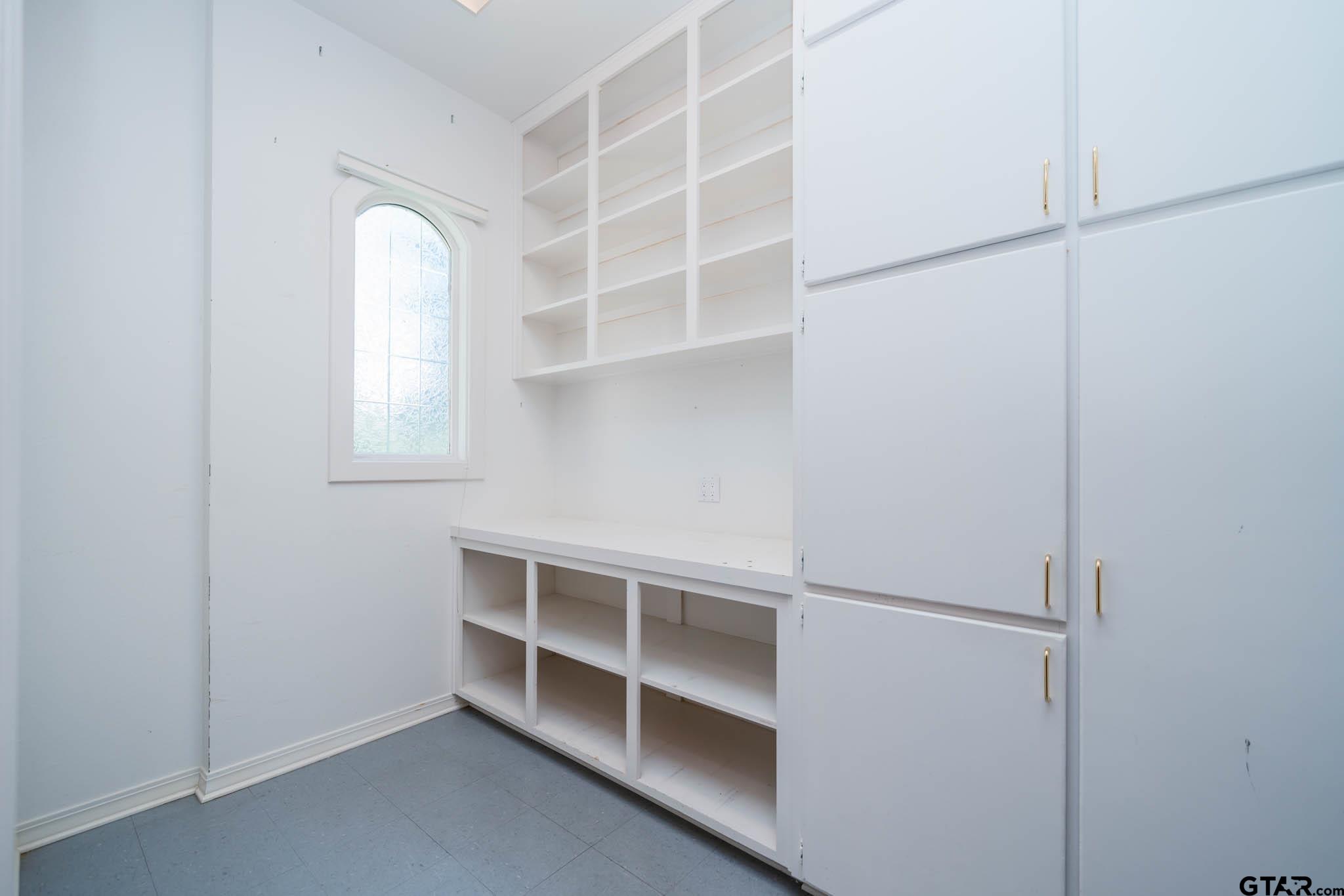 7 Summer Creek Way Longview, TX 75604 - Photo 19 of 48 a view of an empty walk in closet