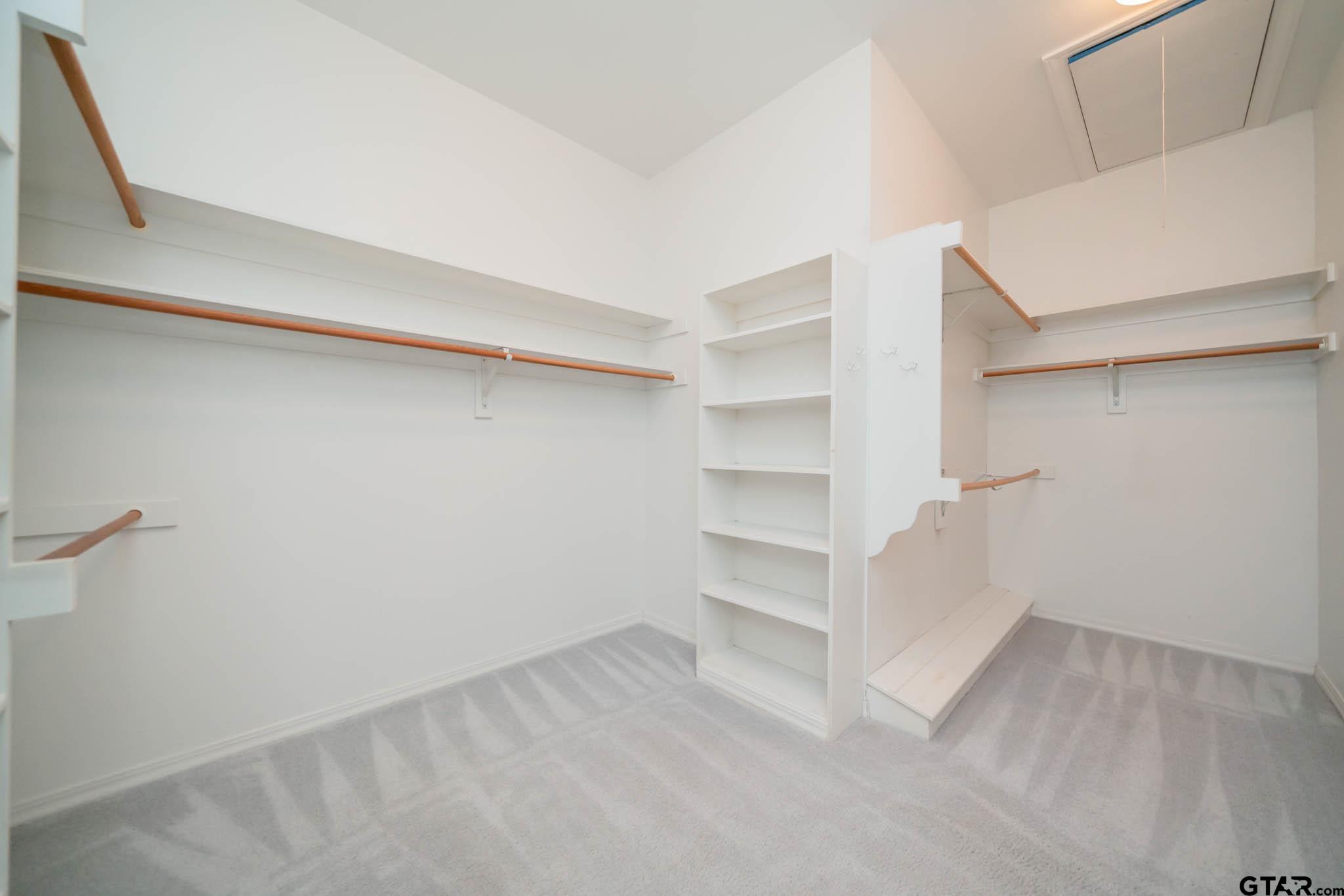 7 Summer Creek Way Longview, TX 75604 - Photo 23 of 48 a view of an empty walk in closet