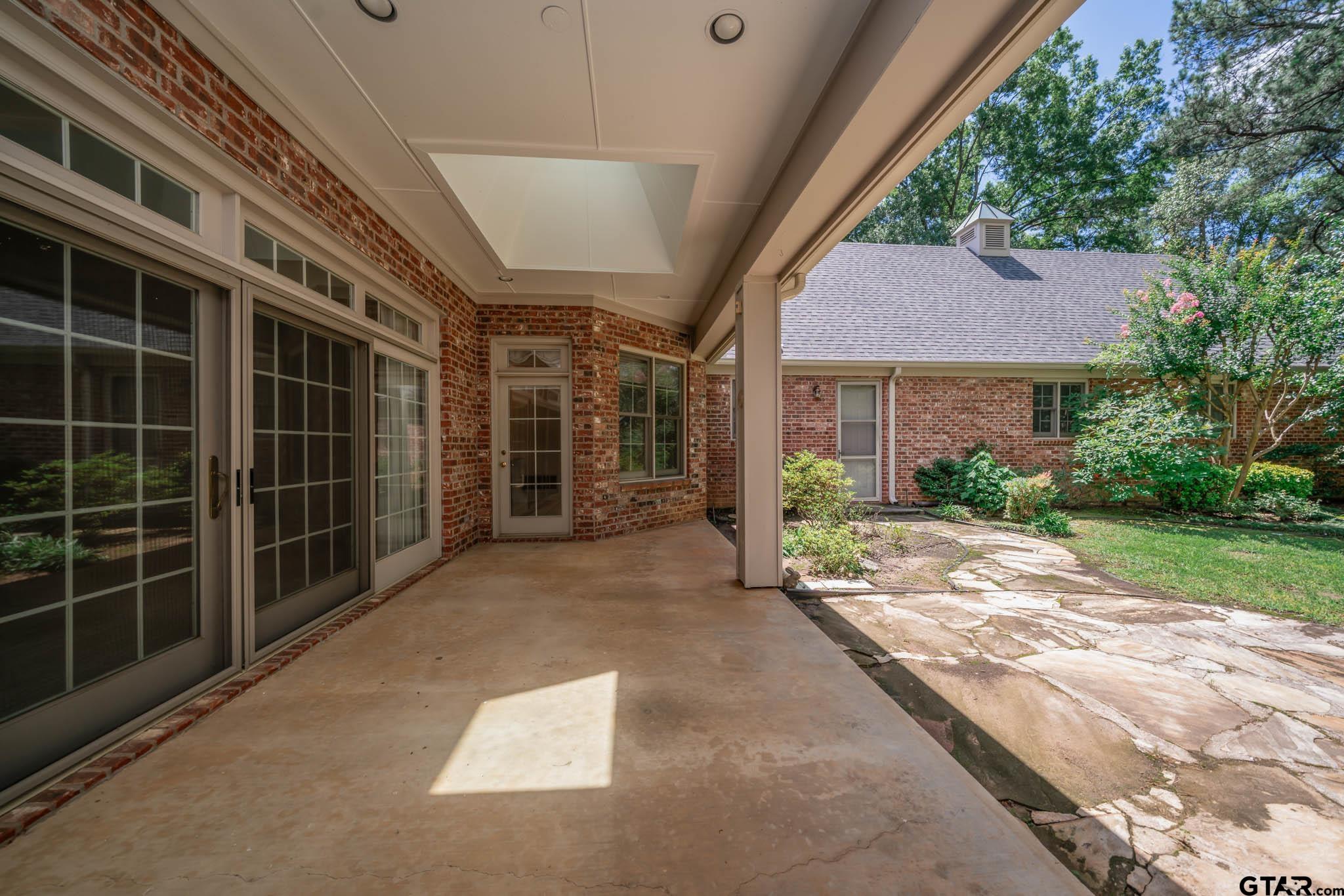 7 Summer Creek Way Longview, TX 75604 - Photo 34 of 48 a view of backyard with green space