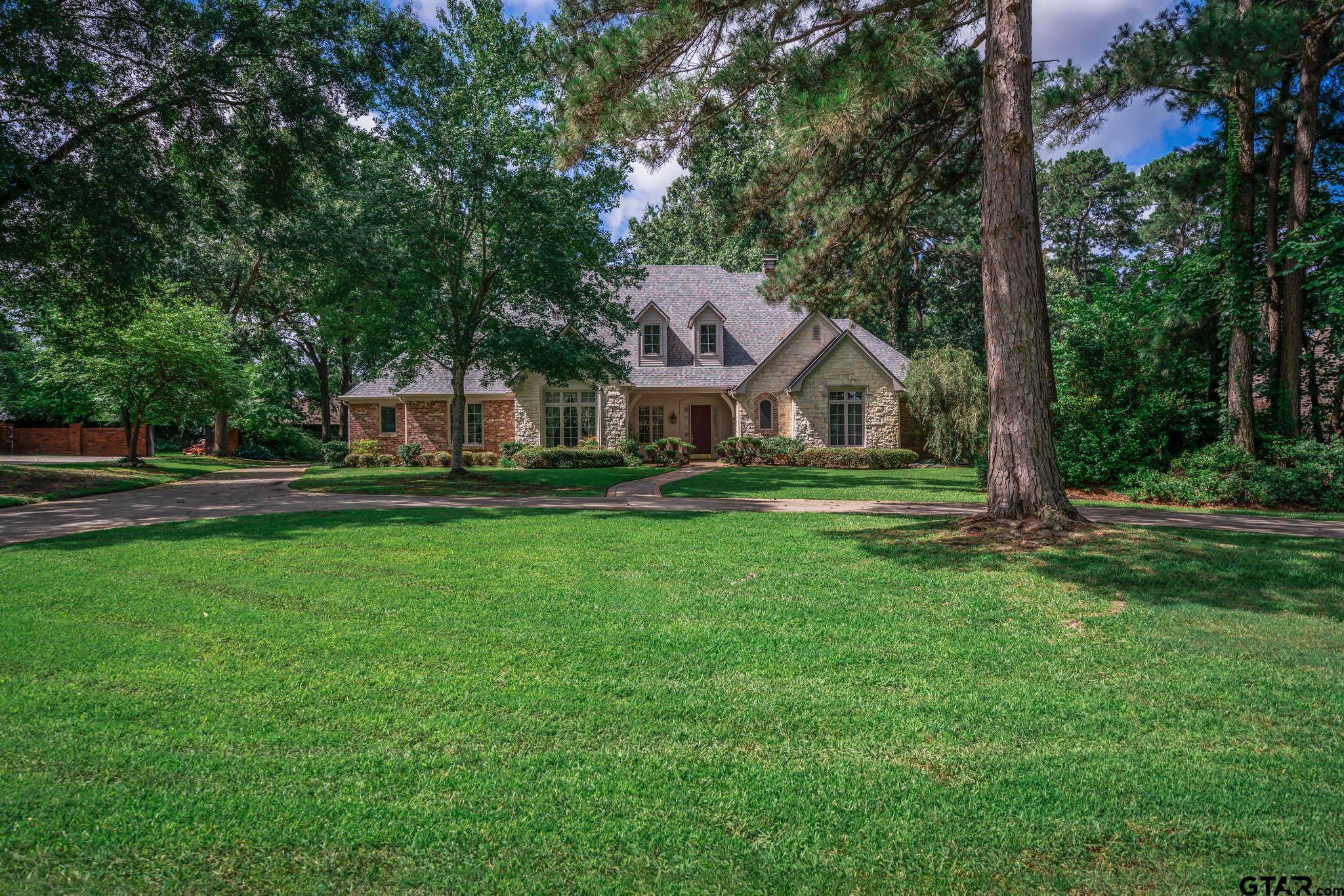 7 Summer Creek Way Longview, TX 75604 - Photo 38 of 48 a front view of house with yard and green space