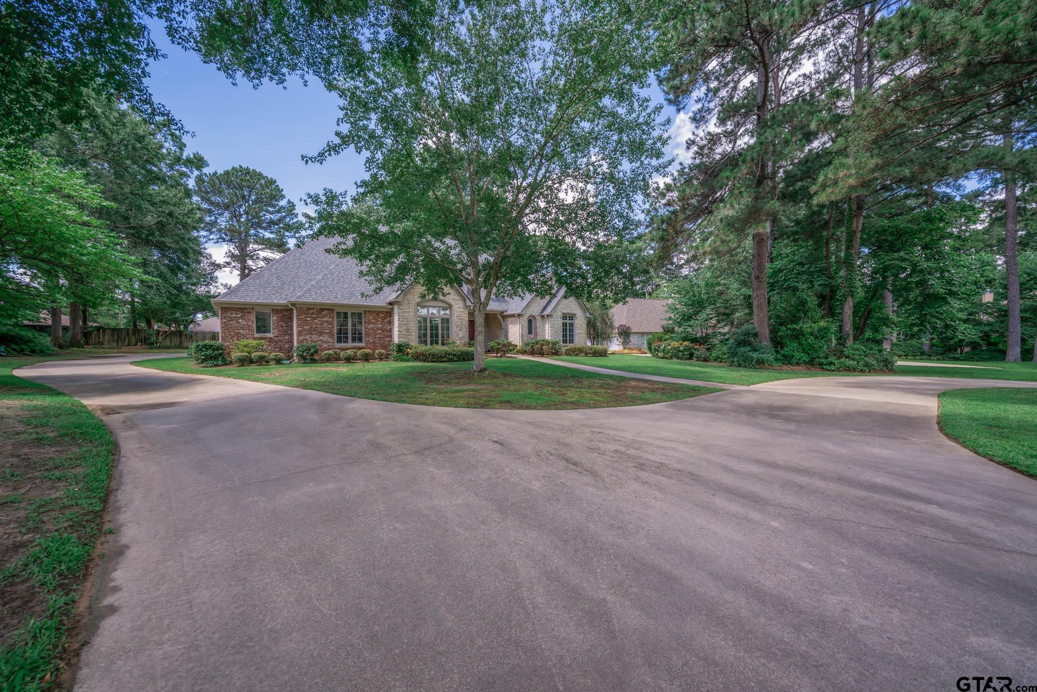 7 Summer Creek Way Longview, TX 75604 - Photo 40 of 48 a view of road with trees and trees