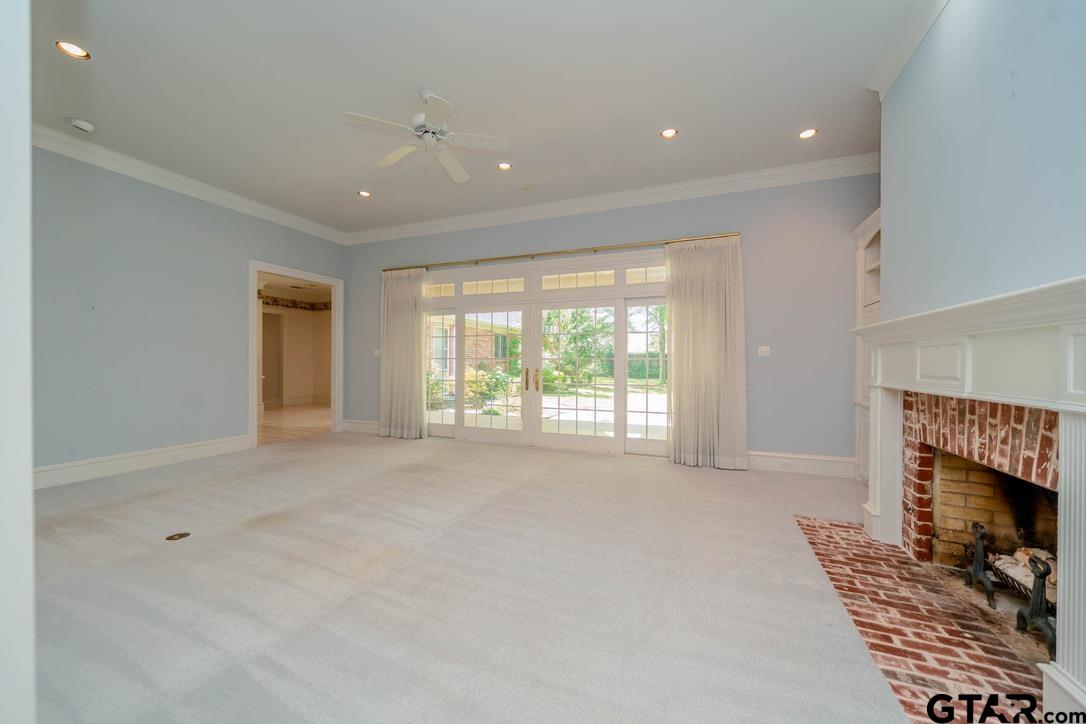 7 Summer Creek Way Longview, TX 75604 - Photo 7 of 48 a big room with windows and fireplace