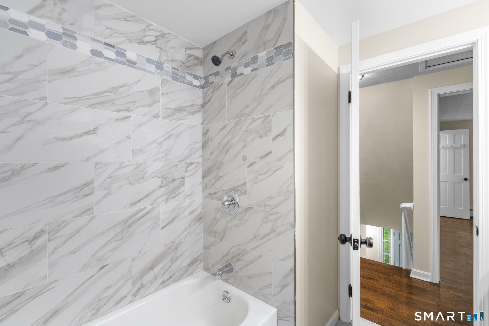 7 Sycamore Terrace Windham, CT 06280 - Photo 28 of 40 a bathroom with a bathtub