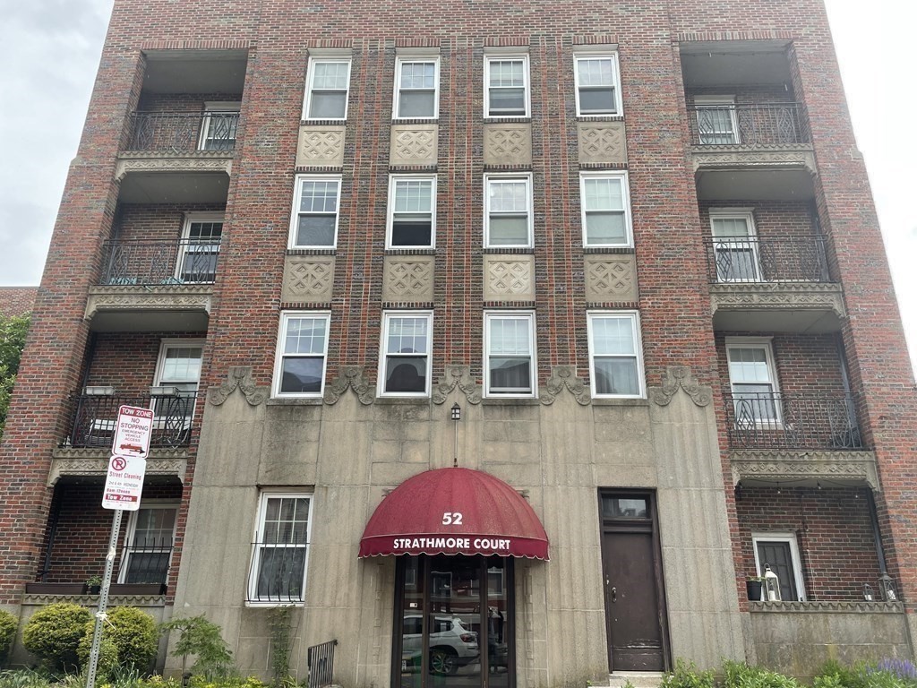 52 Strathmore Road, Unit 25 Boston, MA 02135 - Photo 12 of 12 a front view of a building