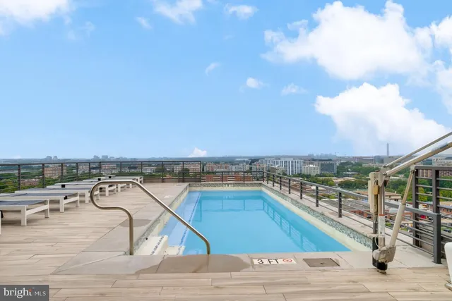 a view of a building from a glass door