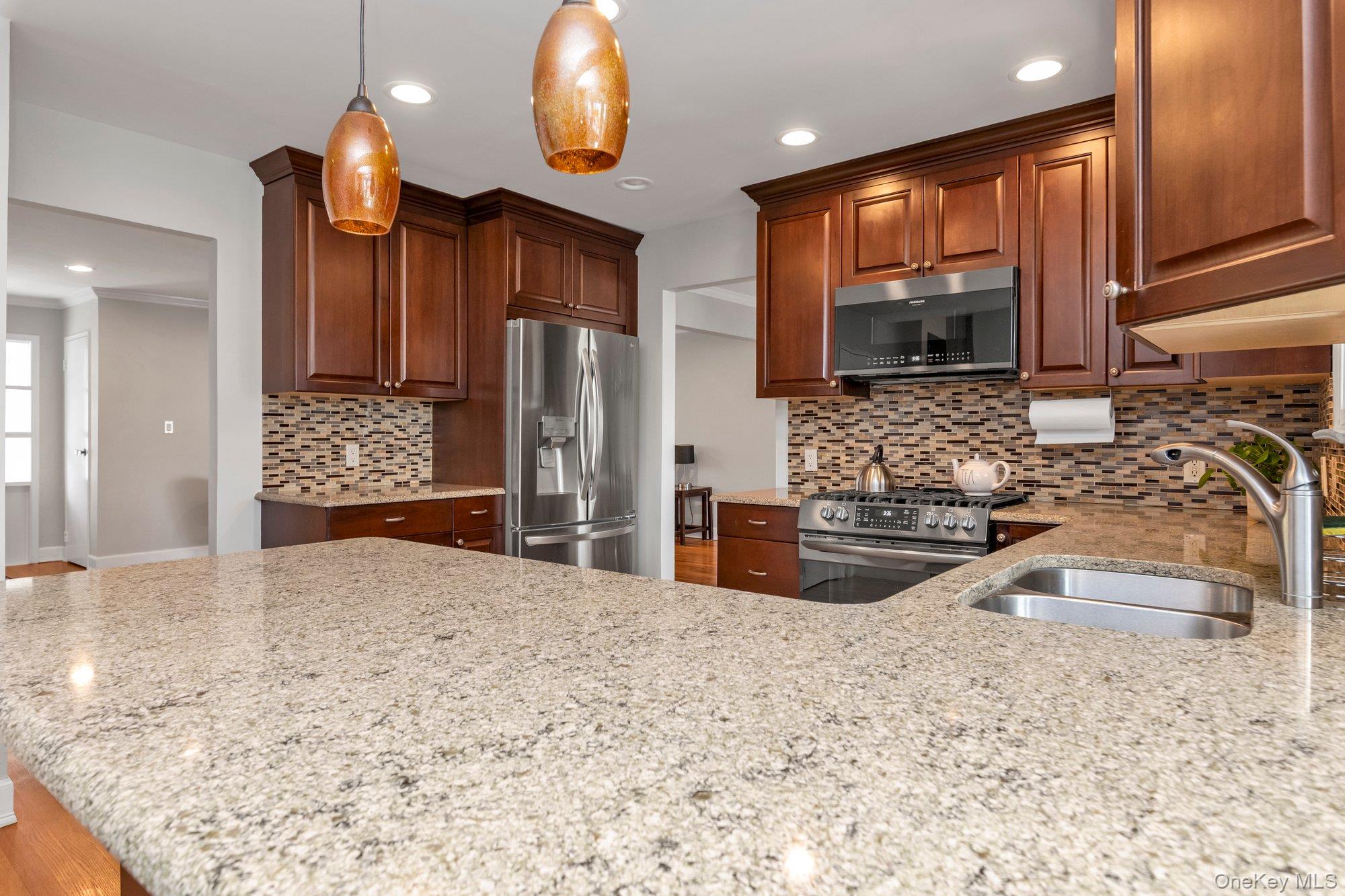 2038 Ripley Lane Merrick, NY 11566 - Photo 7 of 22 Center Island in the kitchen