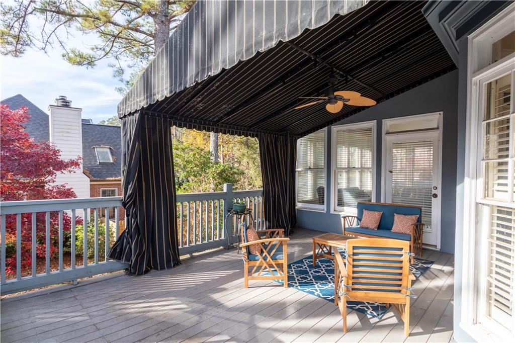 3910 Spalding Bluff Drive Peachtree Corners, GA 30092 - Photo 12 of 35 a backyard of a house with outdoor seating