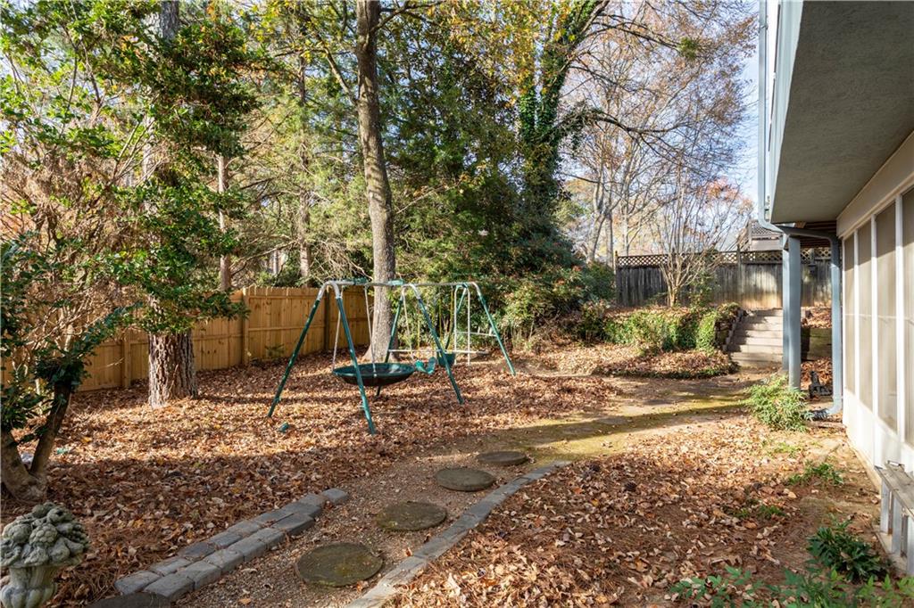 3910 Spalding Bluff Drive Peachtree Corners, GA 30092 - Photo 35 of 35 a view of a yard with plants and trees