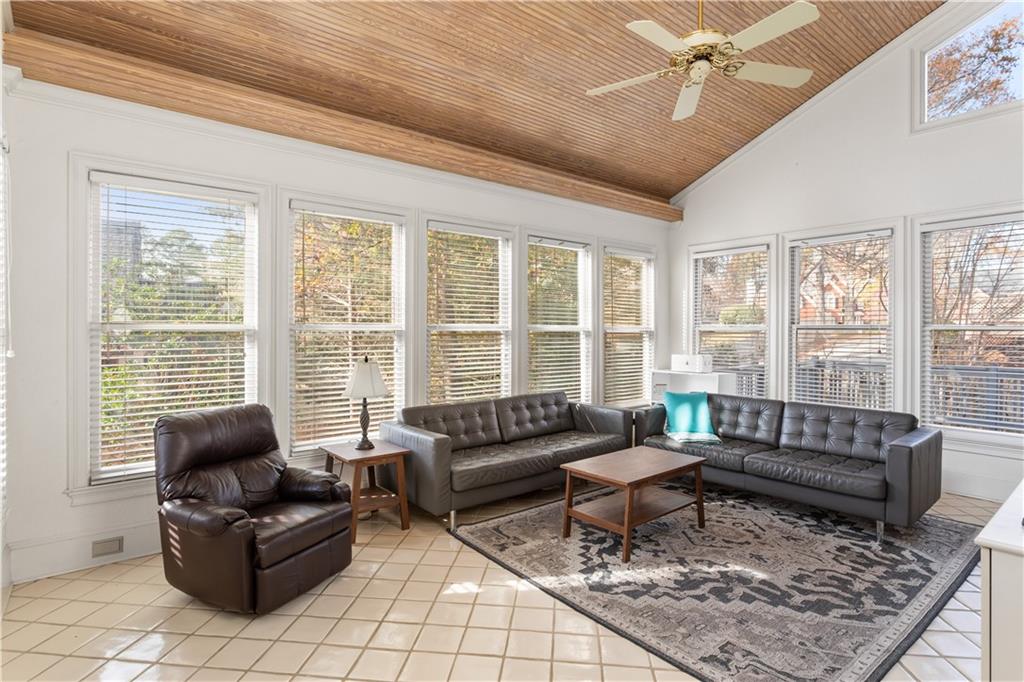3910 Spalding Bluff Drive Peachtree Corners, GA 30092 - Photo 5 of 35 a living room with furniture and a large window