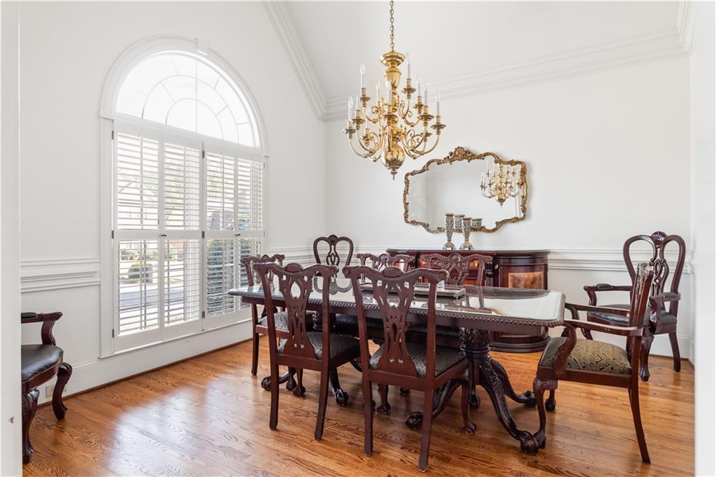 3910 Spalding Bluff Drive Peachtree Corners, GA 30092 - Photo 7 of 35 a view of a dining room with furniture window and wooden floor