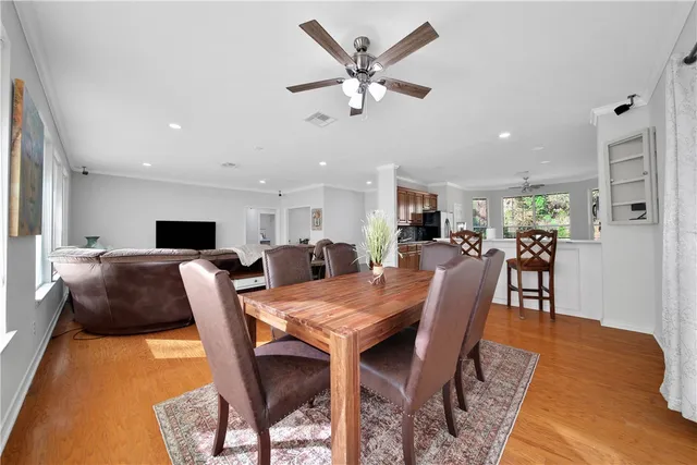 a view of a dining room with furniture