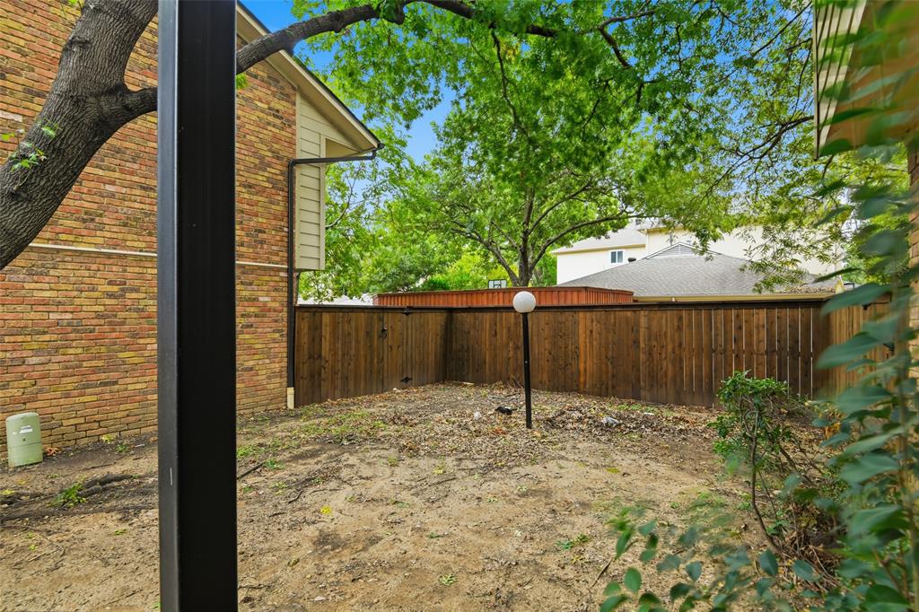 6646 East Lovers Lane, Unit 1201 Dallas, TX 75214 - Photo 2 of 24 a backyard of a house with lots of green space