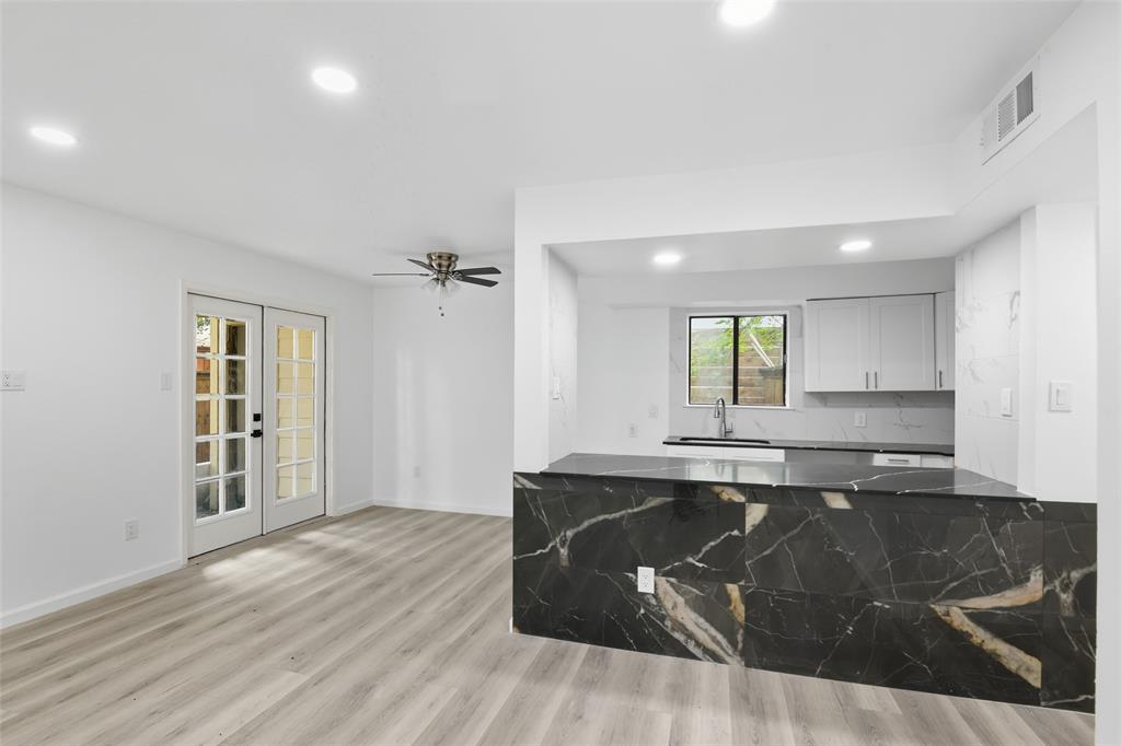 6646 East Lovers Lane, Unit 1201 Dallas, TX 75214 - Photo 9 of 24 a kitchen with a sink and cabinets