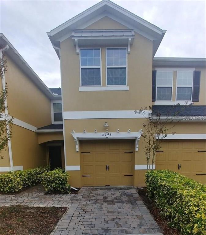 8145 Serenity Spring Drive, Unit GE Windermere, FL 34786 - Photo 1 of 1 a front view of a house