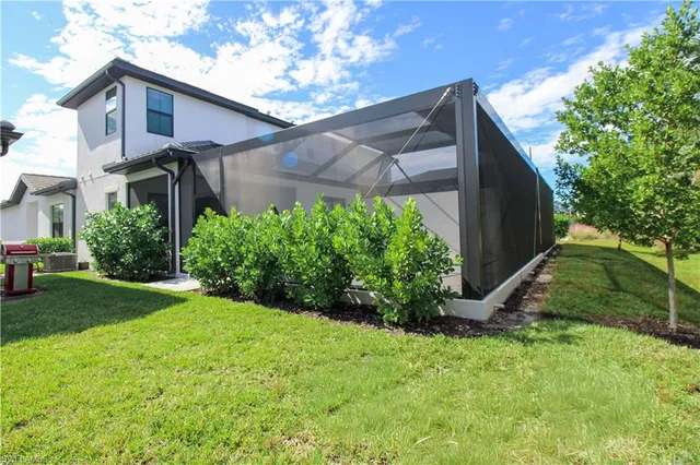 a view of a back yard of the house